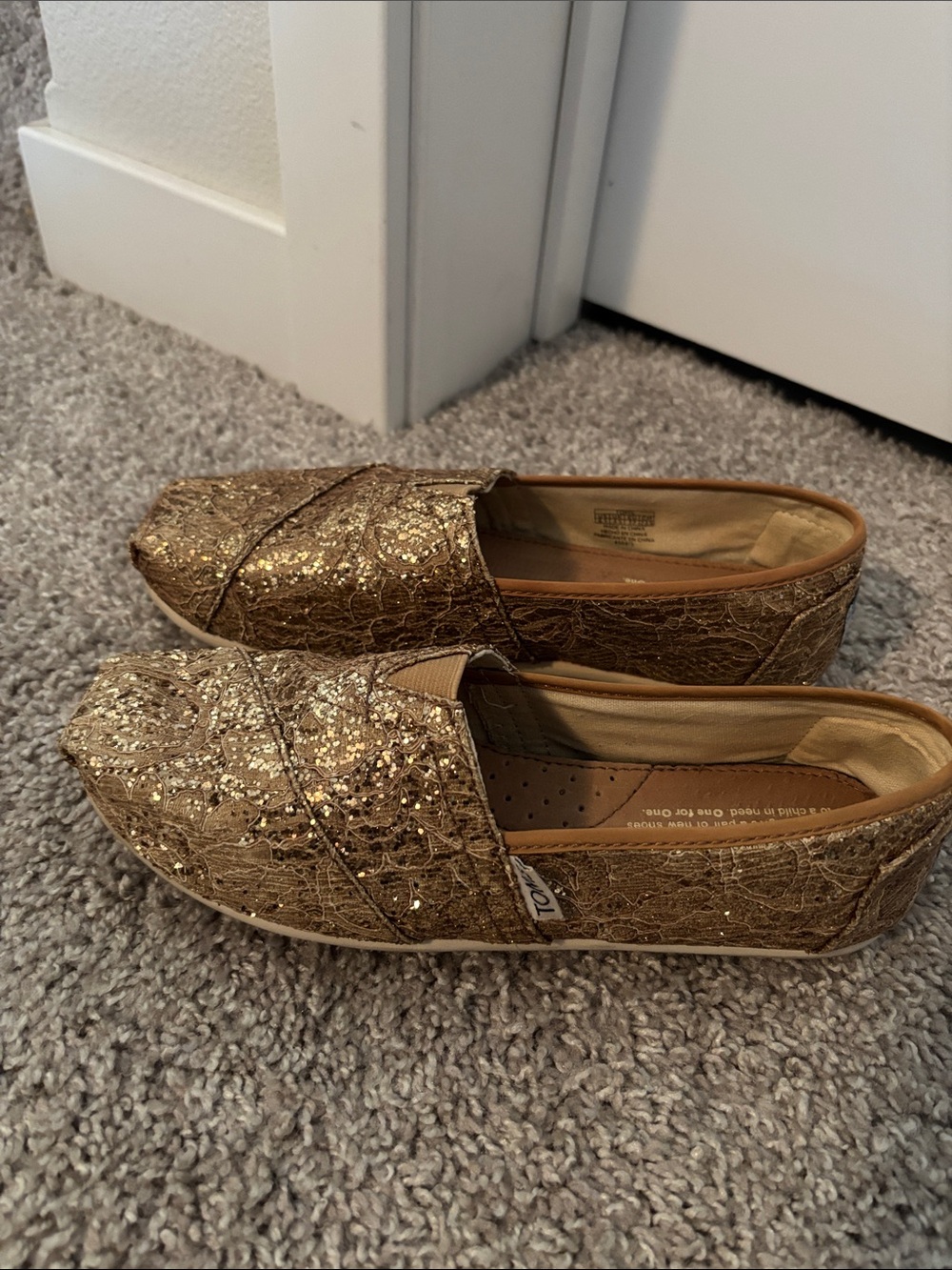 TOMS Women's Gold Glitter Slip-On Flats